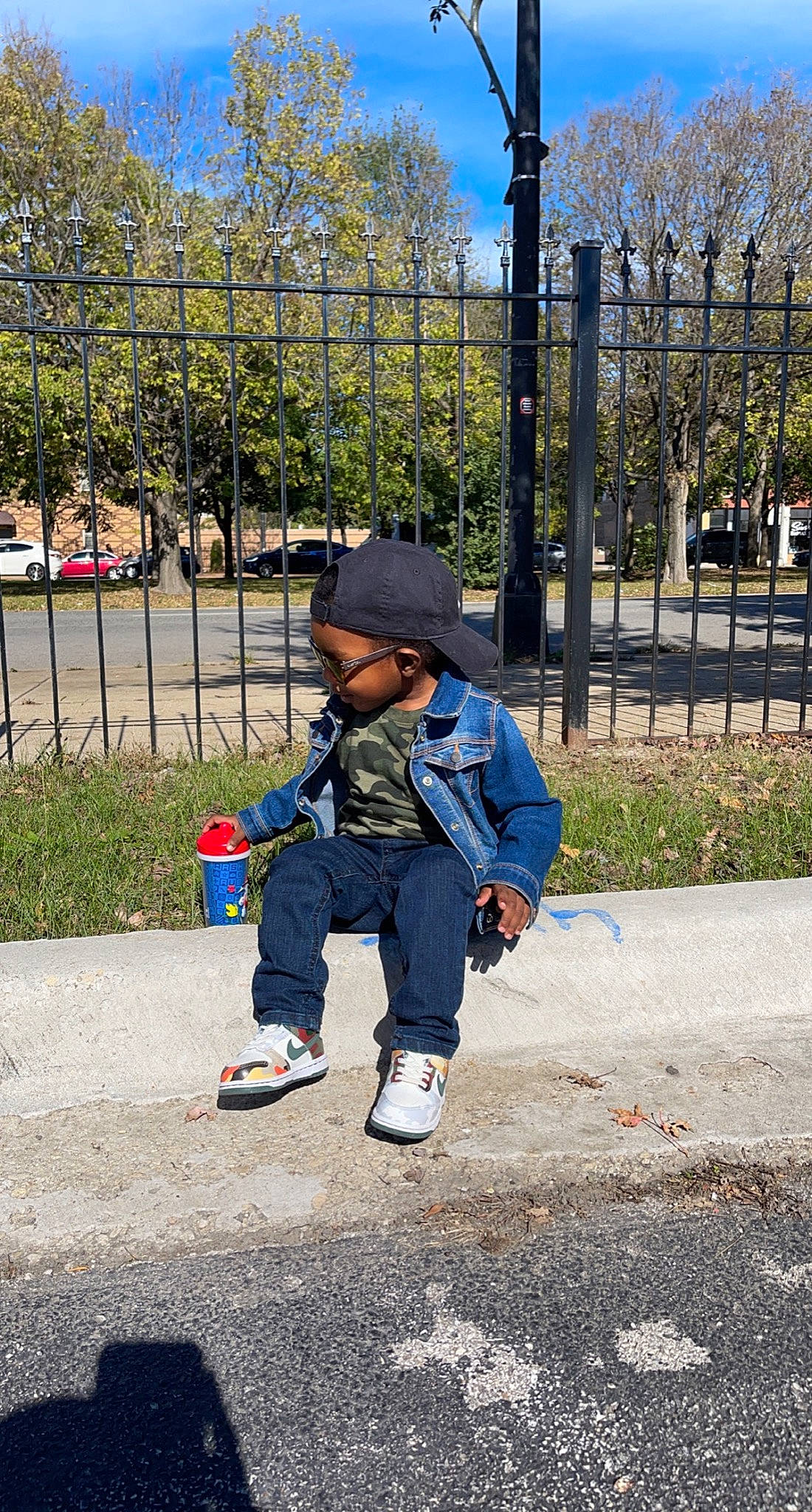 Ej joined the competition — help win amazing prizes! asphalt, city, denim, electric_blue, fence, grass, hat, headwear, jacket, leisure, outerwear, person, plant, recreation, road, road_surface, sidewalk, sky, sneakers, street_fashion