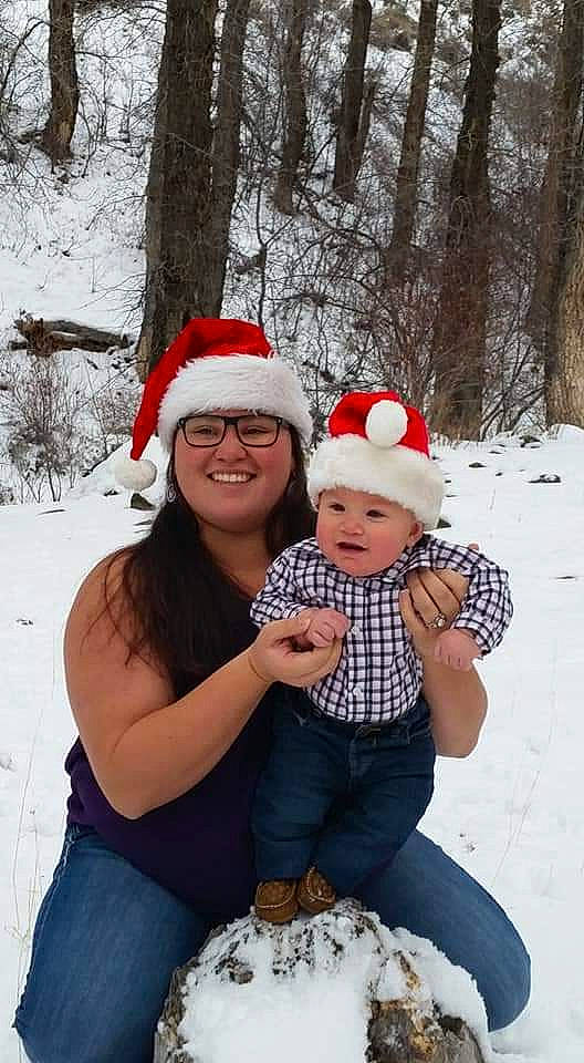 Dillon is registered to the contest to win money with this photo: child, headwear, joy, person, playing_in_the_snow, snow, snowman, toddler, winter