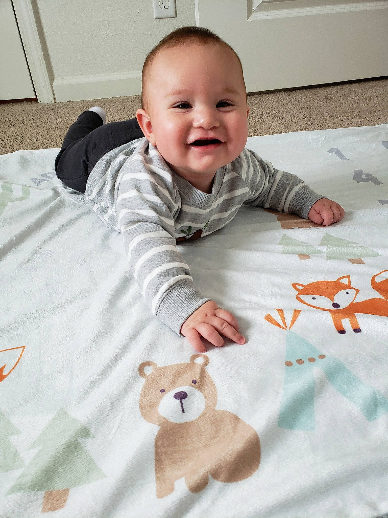 Dillon joined the competition — help win amazing prizes! baby, baby_products, baby_toddler_clothing, baby_toys, blanket, child, linens, person, play, product, room, skin, textile, toddler, toy, tummy_time