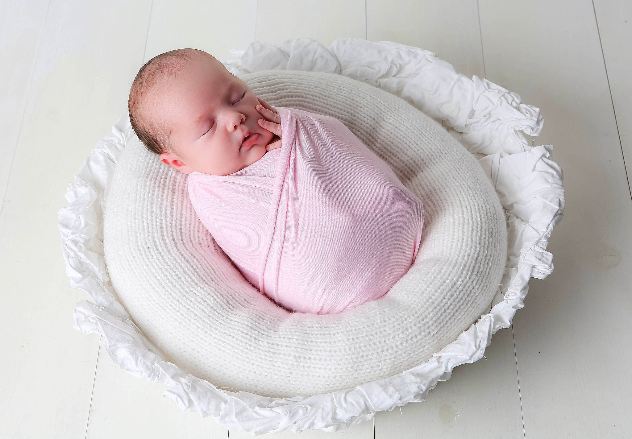 Brodie is registered to the contest to win money with this photo: baby, baby_products, baby_sleeping, baby_toddler_clothing, bedding, child, comfort, crochet, fashion_accessory, headgear, infant_bed, linens, magenta, pattern, person, product, room, textile, toddler, wool