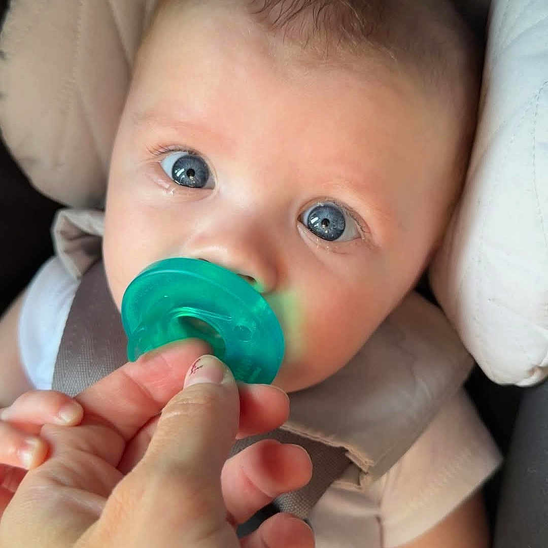 Frederick is registered to the contest to win money with this photo: baby, bodypart, clothing, cream, cushion, cutlery, dessert, face, finger, food, furniture, hand, head, homedecor, icecream, person, photography, portrait, spoon, sweets