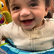 Manuel joined the competition — help win amazing prizes! accessories, baby, babylaughing, balloon, bodypart, clothing, coat, face, happy, head, jacket, laughing, mouth, person, photography, playarea, portrait, smile, teeth, toy