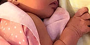 Lilah joined the competition — help win amazing prizes! newborn, baby, infant, blanket, pink, polka_dot, sleeping, face, hand, skin, person, portrait, closeup, resting, soft, cuddle, yellow_pillow, comfort, newborn_baby, baby_girl