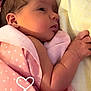 newborn, baby, infant, blanket, pink, polka_dot, sleeping, face, hand, skin, person, portrait, closeup, resting, soft, cuddle, yellow_pillow, comfort, newborn_baby, baby_girl