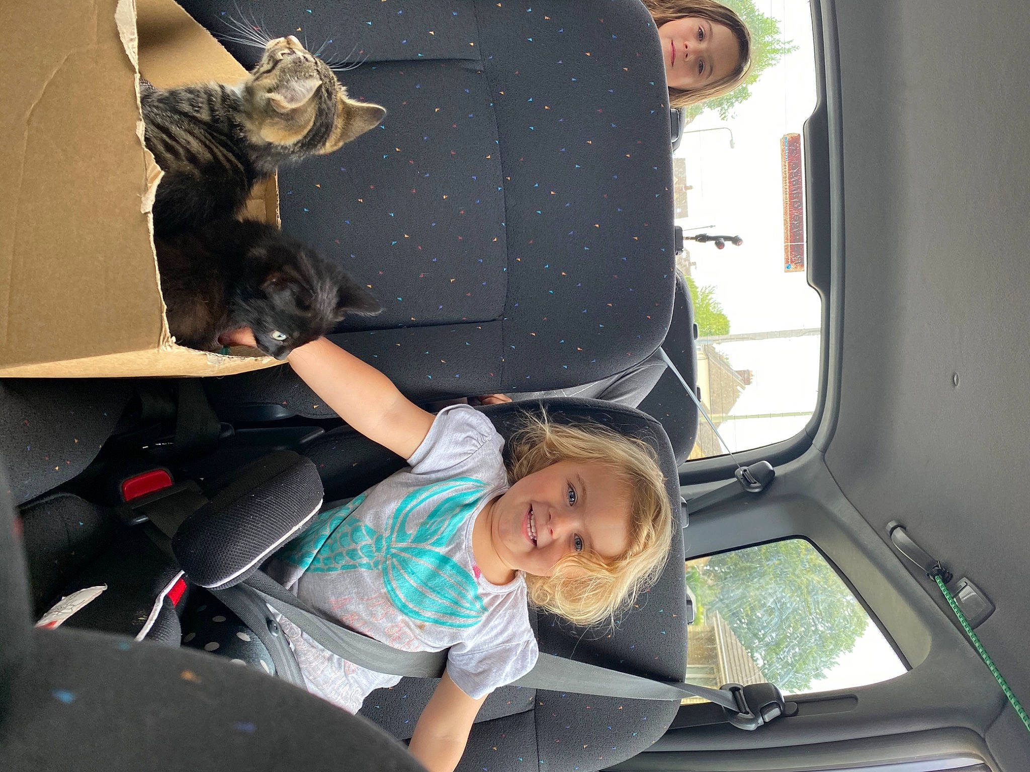 Demi-leigh is registered to the contest to win money with this photo: car_seat, family_car, joy, person, vehicle