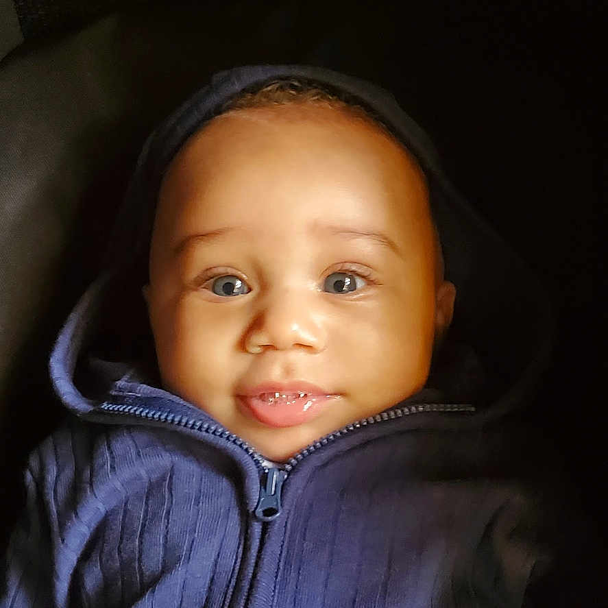 Jayceon joined the competition — help win amazing prizes! baby, child, hoodie, blue_clothing, smile, face, eyes, infant, portrait, cute, young_child, apparel, baby_clothes, happy, closeup, person, warm_clothing, expression, indoor, baby_face