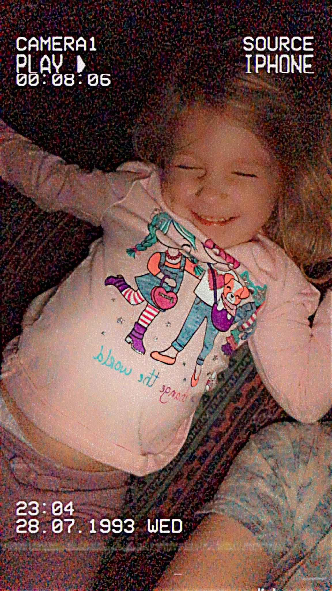 Maya is registered to the contest to win money with this photo: baby, baby_toddler_clothing, cheek, child, font, fun, happy, human_body, joy, logo, pattern, person, photo_caption, play, portrait_photography, sitting, sleeve, smile, t_shirt, toddler