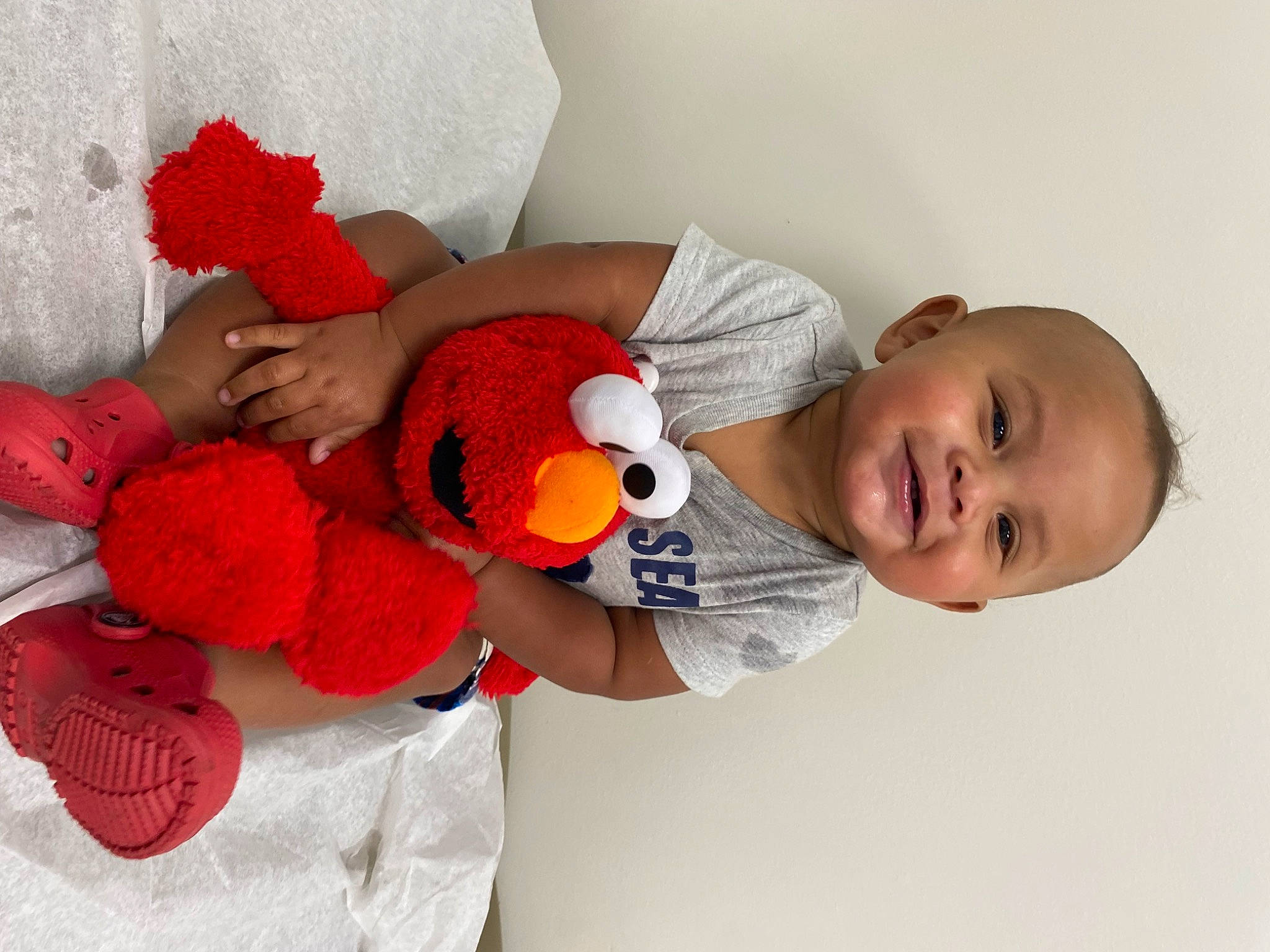 Zaylin is registered to the contest to win money with this photo: arm, baby, baby_products, baby_sleeping, baby_toddler_clothing, baby_toys, bird, carmine, child, comfort, happy, joy, mammal, person, plush, room, sleeve, stuffed_toy, textile, toddler