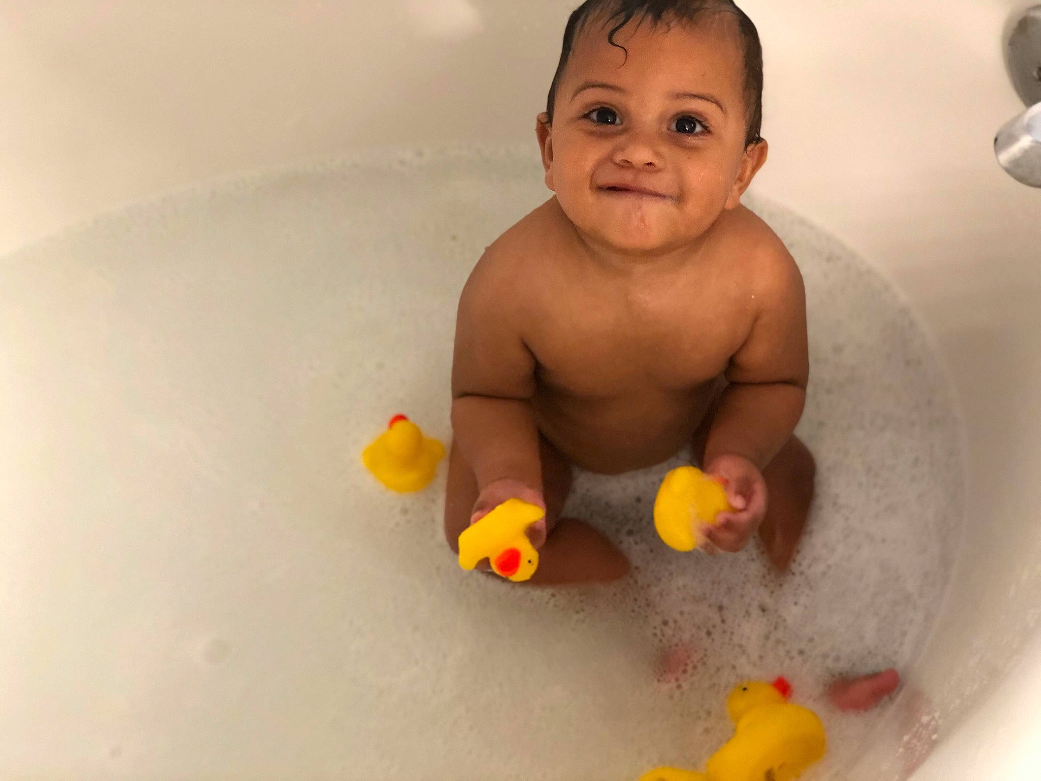 Aj is registered to the contest to win money with this photo: baby, baby_bathing, baby_products, bath_toy, bathing, bathroom, bathtub, chest, child, face, fluid, fun, happy, joy, liquid, person, plumbing, plumbing_fixture, smile, toddler