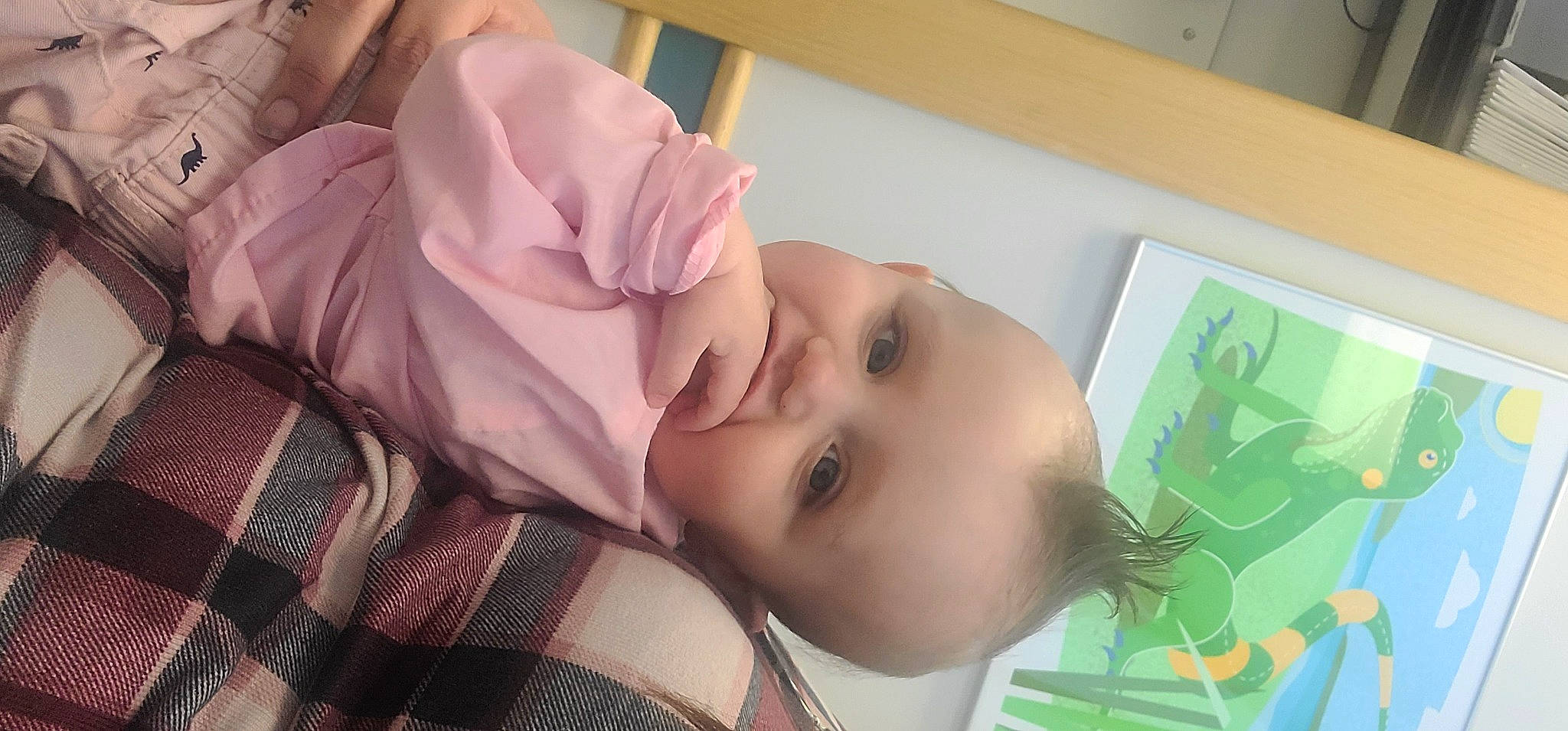 Layne is registered to the contest to win money with this photo: baby, baby_toddler_clothing, cheek, child, comfort, eyebrow, eyelash, happy, hat, iris, lip, nose, pattern, person, plaid, room, skin, smile, tartan, textile