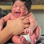 Neena is registered to the contest to win money with this photo: newborn, baby, infant, diaper, hands, crying, yawning, hair, skin, face, fingers, toes, blanket, indoor, person, holding, cute, small, child, portrait