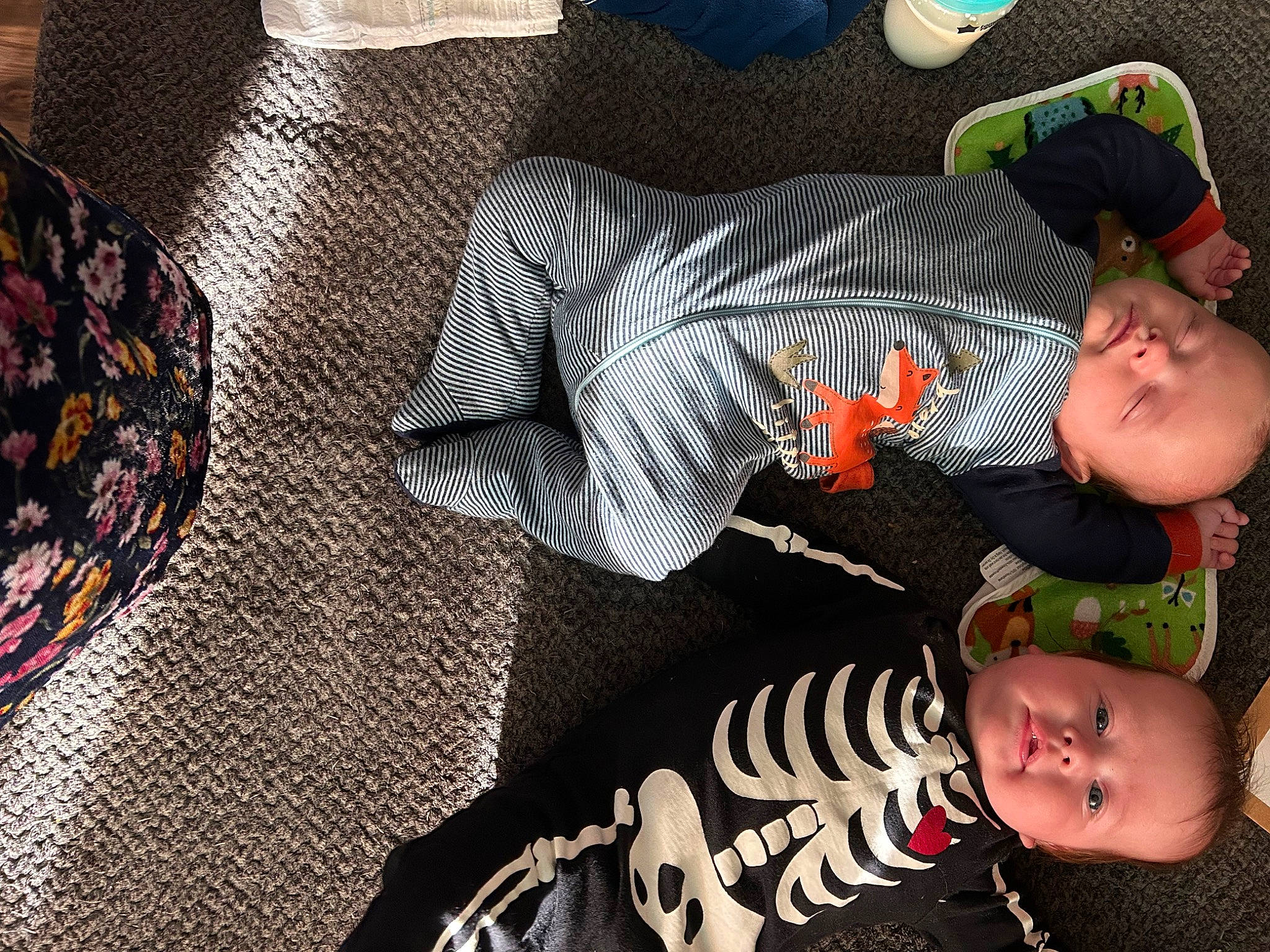 Dennis And James is registered to the contest to win money with this photo: baby, baby_products, baby_toddler_clothing, child, comfort, flooring, fun, happy, lap, leg, linens, pattern, person, product, room, sitting, toddler, tree