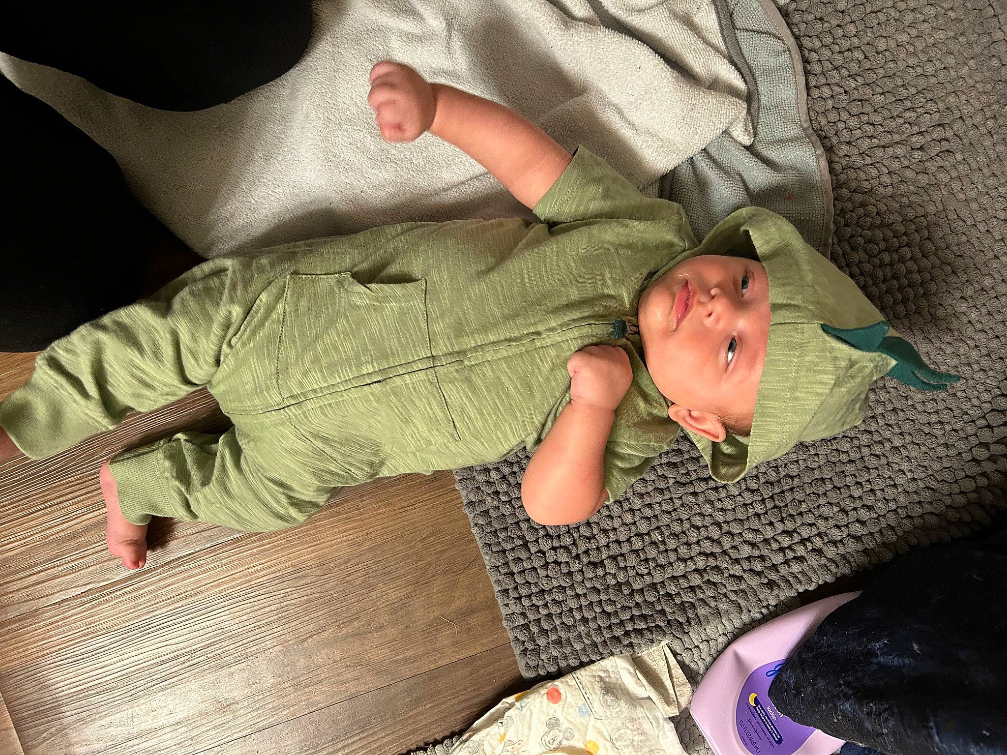 James joined the competition — help win amazing prizes! baby, baby_toddler_clothing, camouflage, child, comfort, elbow, fun, gesture, headwear, human_leg, knee, lap, linens, military_camouflage, pattern, person, room, sitting, sleep, sleeve