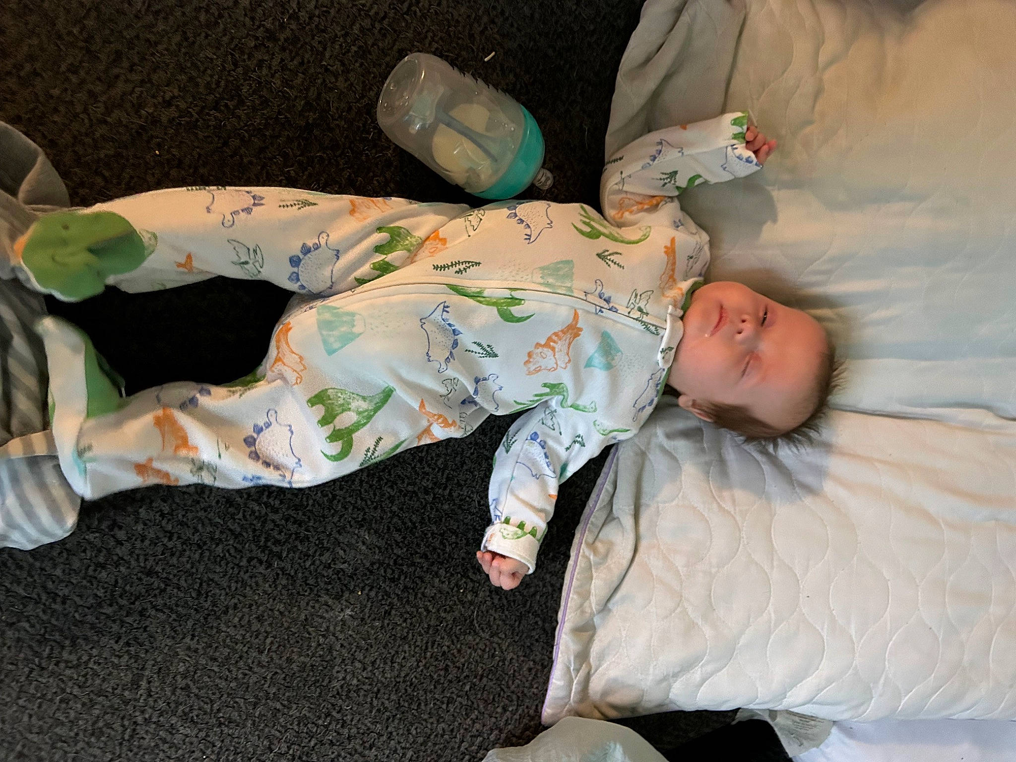 Dennis joined the competition — help win amazing prizes! baby, baby_products, baby_toddler_clothing, bedtime, child, comfort, couch, hat, human_leg, knee, lap, linens, nap, person, room, sitting, sleep, sock, thigh, toddler