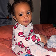 Tyzae joined the competition — help win amazing prizes! baby, bed, child, colorful_toys, cozy, curly_hair, curly_puffs, cute, indoor, orange_bedspread, pajamas, person, playful, portrait, sleepwear, smiling, spiderman, toddler, toy, young_child