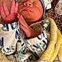 Grayson is registered to the contest to win money with this photo: newborn, baby, sleeping, blanket, cap, hand, infant, cozy, soft, cute, wrapped, closeup, skin, person, bed, rest, peaceful, small, cute_baby, indoors