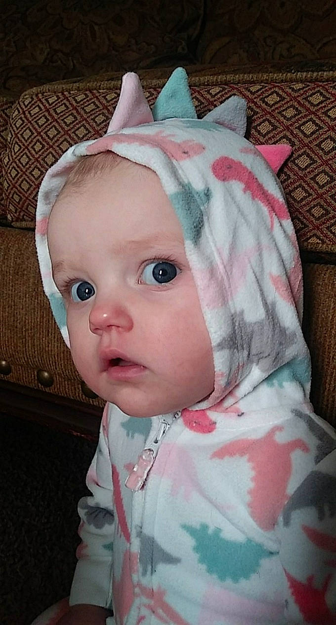 Emberlyn is registered to the contest to win money with this photo: baby, cheek, child, ear, face, hair_accessory, head, headgear, lip, person, pink, toddler