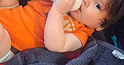 Legion joined the competition — help win amazing prizes! baby, blanket, bottle, casual, child, couch, cozy, eyes, face, feeding, hair, indoors, infant, lying_down, orange_shirt, photograph, portrait, red_blanket, smiling, 家庭