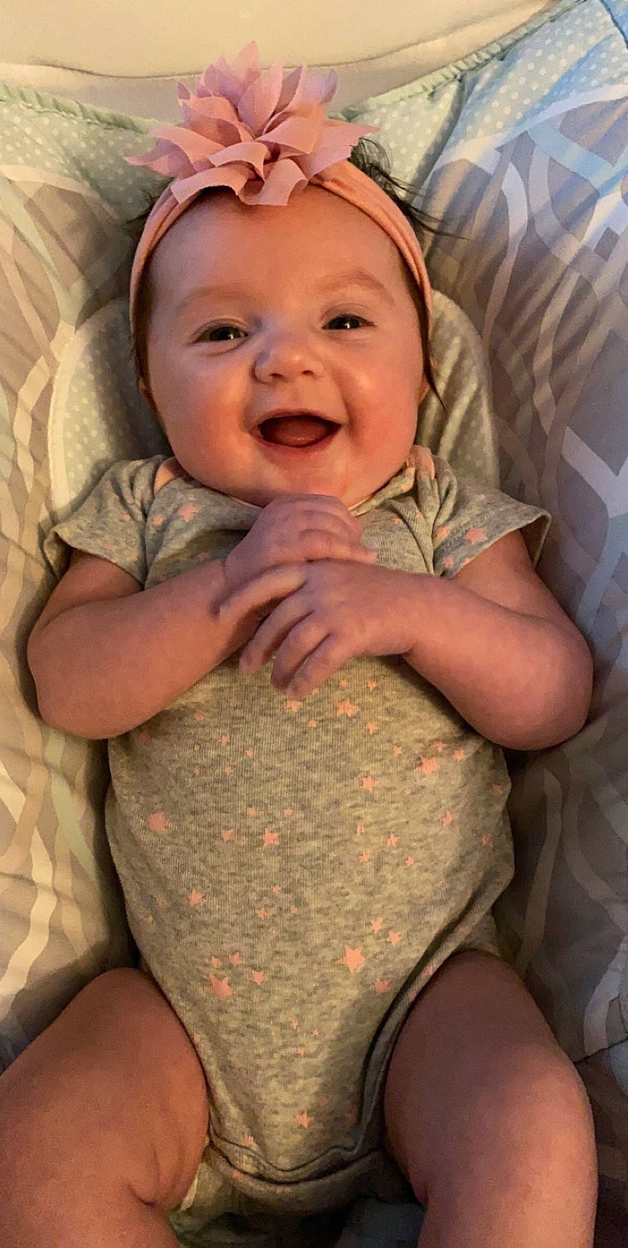 Makenzie is registered to the contest to win money with this photo: arm, baby, cheek, child, face, facial_expression, head, headwear, mouth, person, skin, smile, toddler