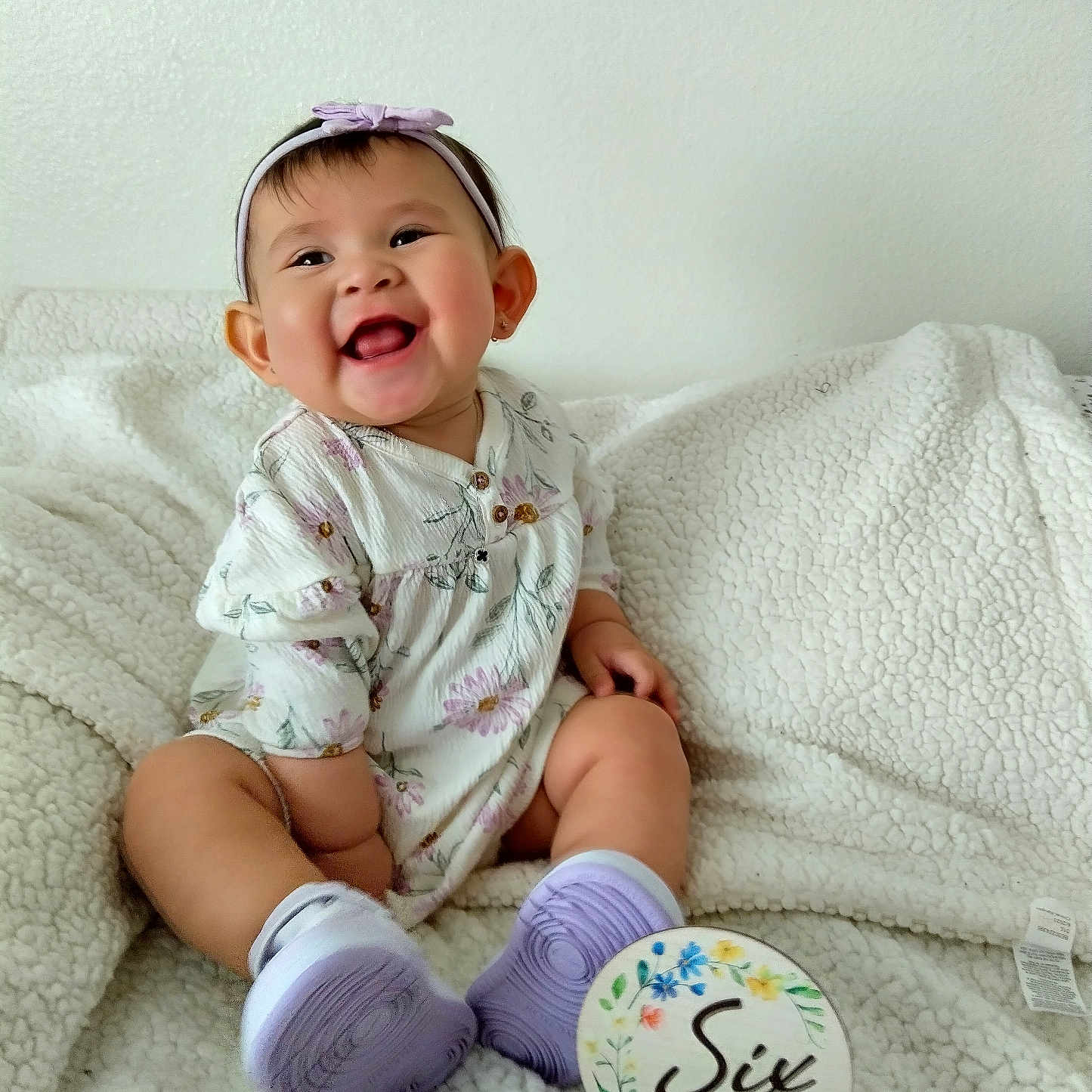 Amaya joined the competition — help win amazing prizes! baby, babylaughing, ball, clothing, face, football, happy, head, hosiery, laughing, person, photography, portrait, sitting, smile, soccer, soccerball, sock, sphere, sport