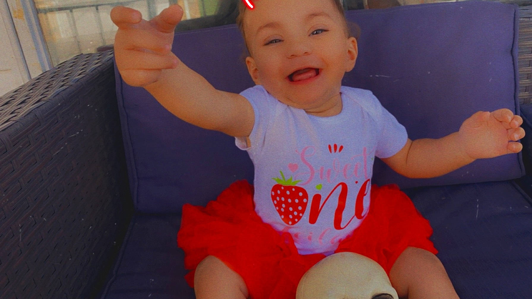 Leilani is registered to the contest to win money with this photo: baby, baby_toddler_clothing, cheek, chin, eye, face, finger, gesture, hairstyle, happy, head, joy, mouth, person, pink, product, skin, sleeve, smile, t_shirt