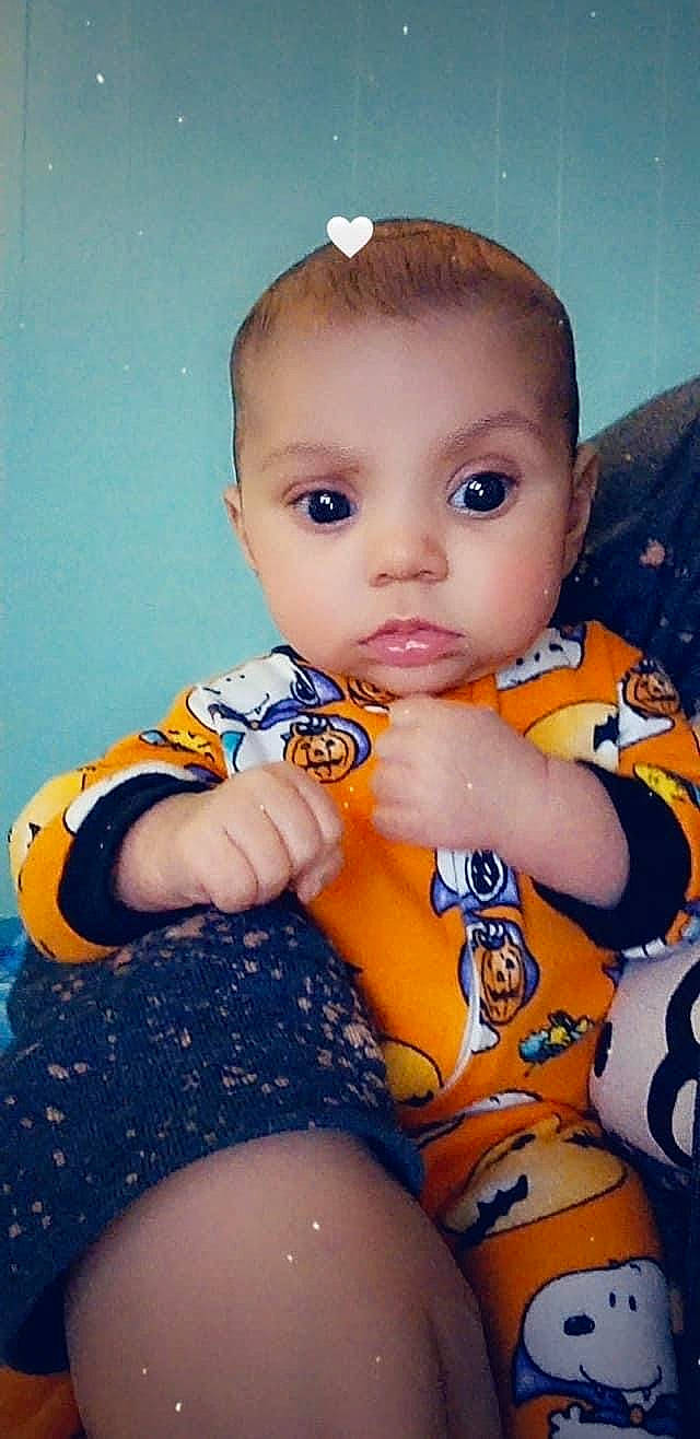 Leilani joined the competition — help win amazing prizes! baby, baby_toddler_clothing, cheek, cool, eyelash, facial_expression, finger, hairstyle, iris, lip, mouth, neck, nose, orange, person, product, skin, sleeve, t_shirt, thigh