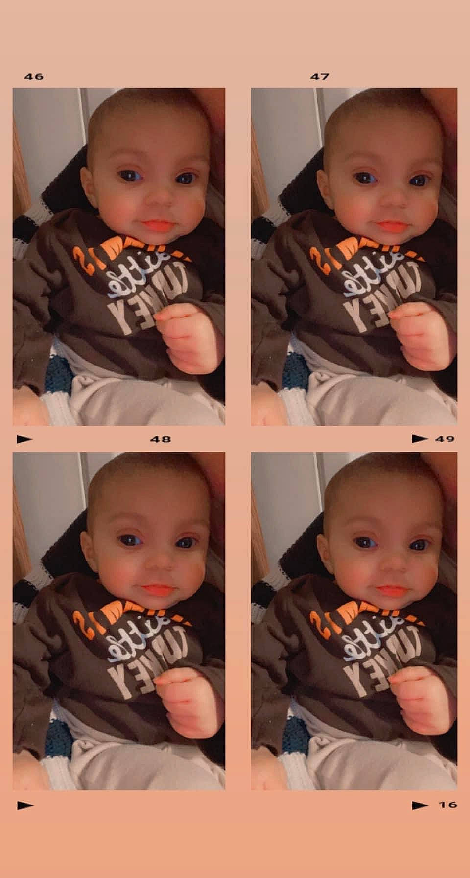 Leilani joined the competition — help win amazing prizes! baby, baby_toddler_clothing, black, cheek, clothing, eye, face, facial_expression, head, human, nose, orange, organ, outerwear, person, photograph, product, skin, sleeve, standing
