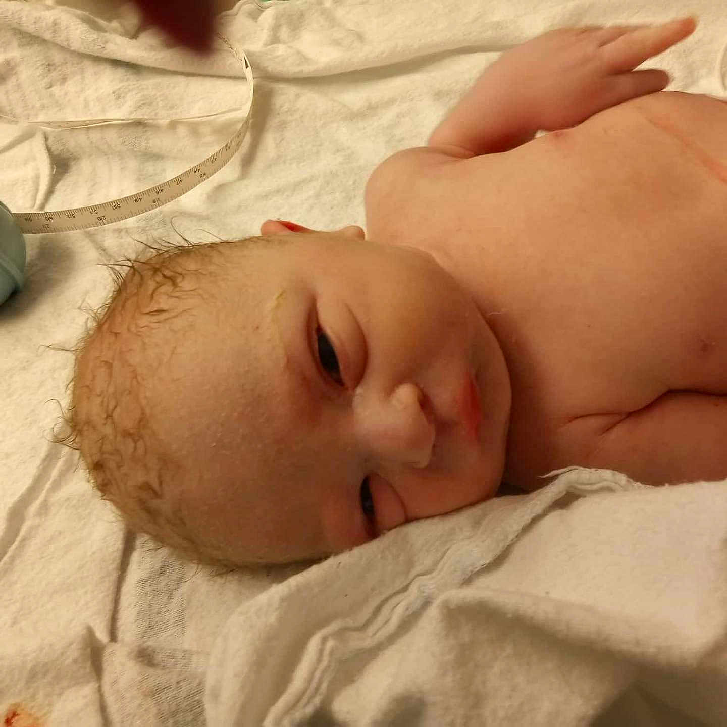 Hayden joined the competition — help win amazing prizes! arm, baby, blanket, chest, eyes, face, hospital, hospital_bed, infant, lying_on_back, measuring_tape, medical, newborn, newborn_care, nose, skin, suction_bulb, towel, umbilical_clamp, wet_hair