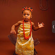 Averi is registered to the contest to win money with this photo: accessories, baby, bodypart, clothing, dancing, dress, eveningdress, face, fashion, finger, formalwear, gown, hand, happy, head, leisureactivities, person, photography, portrait, smile