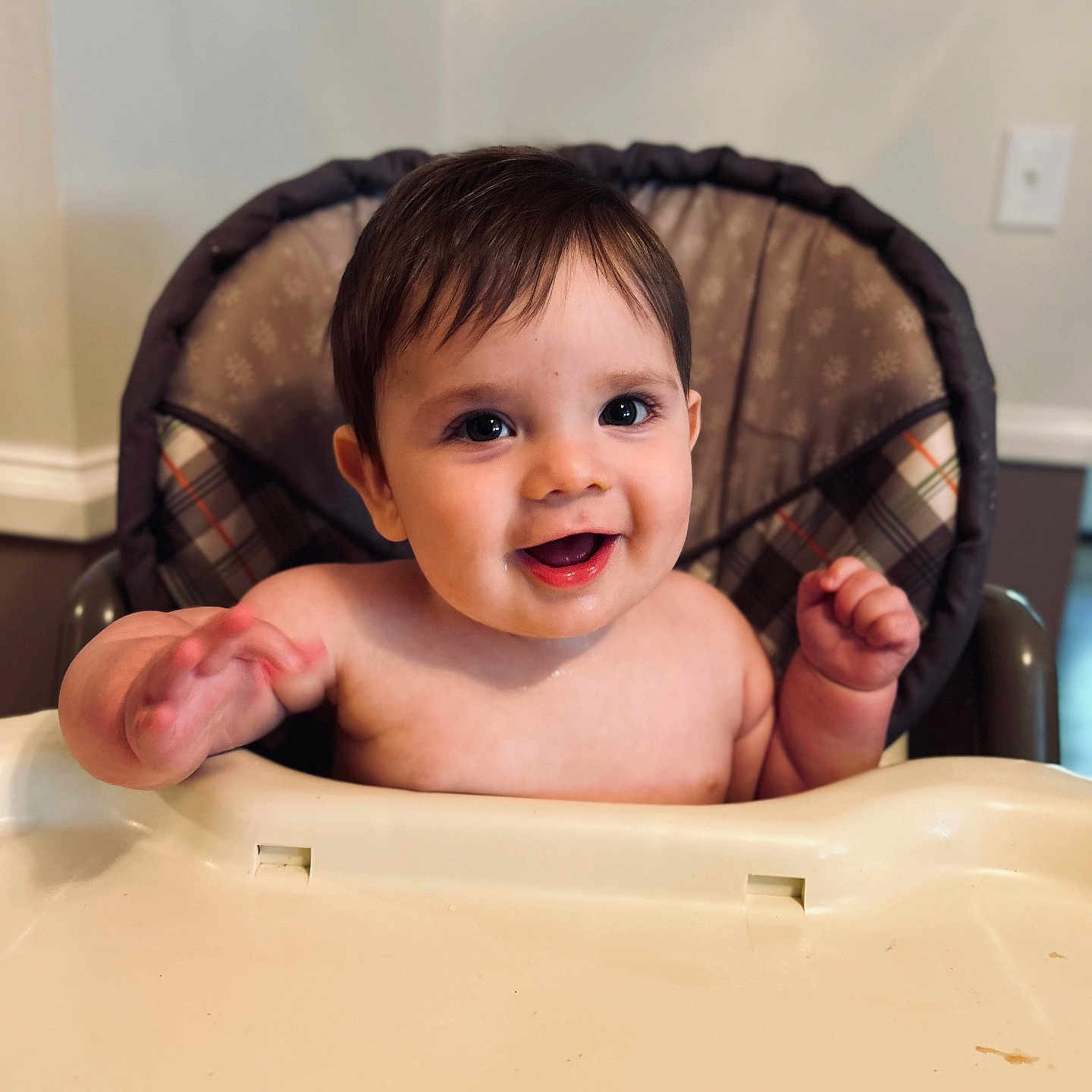 Marty is registered to the contest to win money with this photo: baby, child, cute, expression, eyes, face, furniture, hands, happy, high_chair, home, indoor, infant, person, portrait, seat, skin, smiling, table, young_child