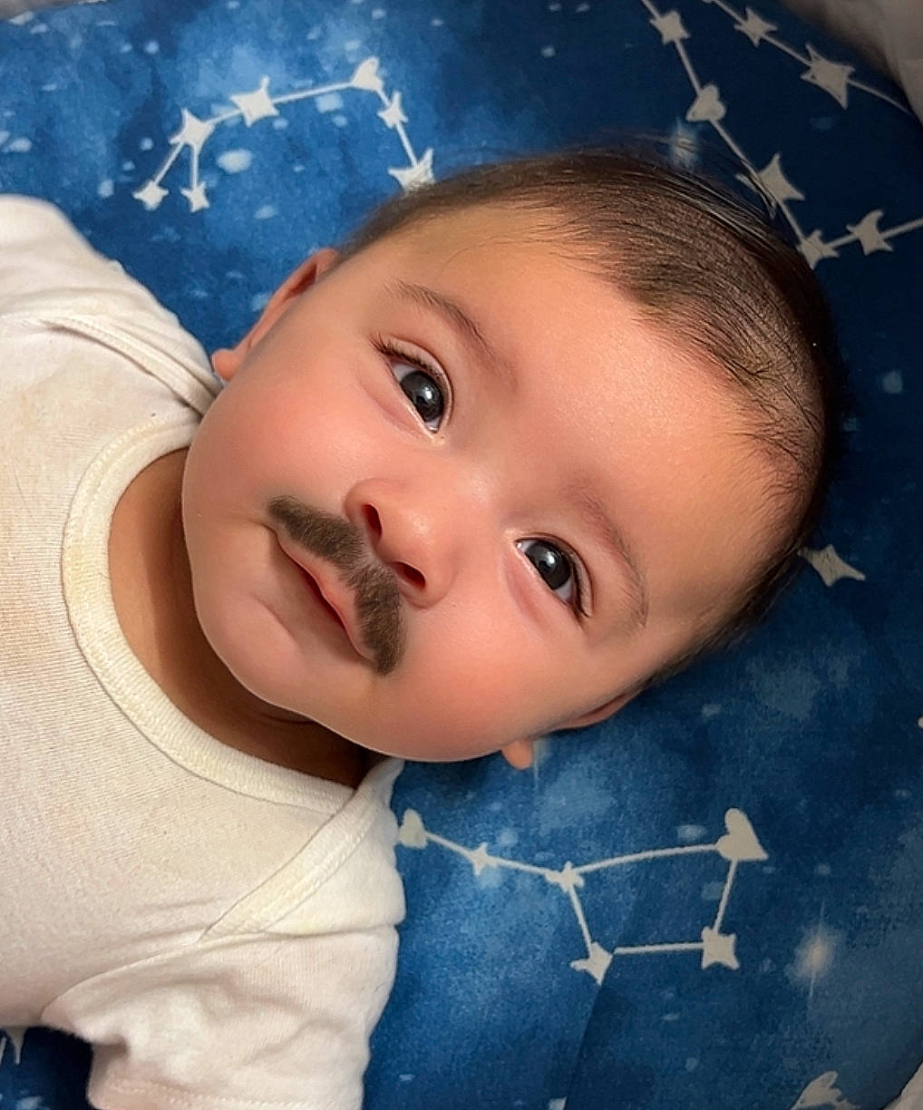 Gabriel is registered to the contest to win money with this photo: azure, baby, baby_toddler_clothing, beauty, cheek, child, cool, electric_blue, eyebrow, eyelash, flash_photography, happy, head, human_body, iris, lip, nose, person, sleeve, smile