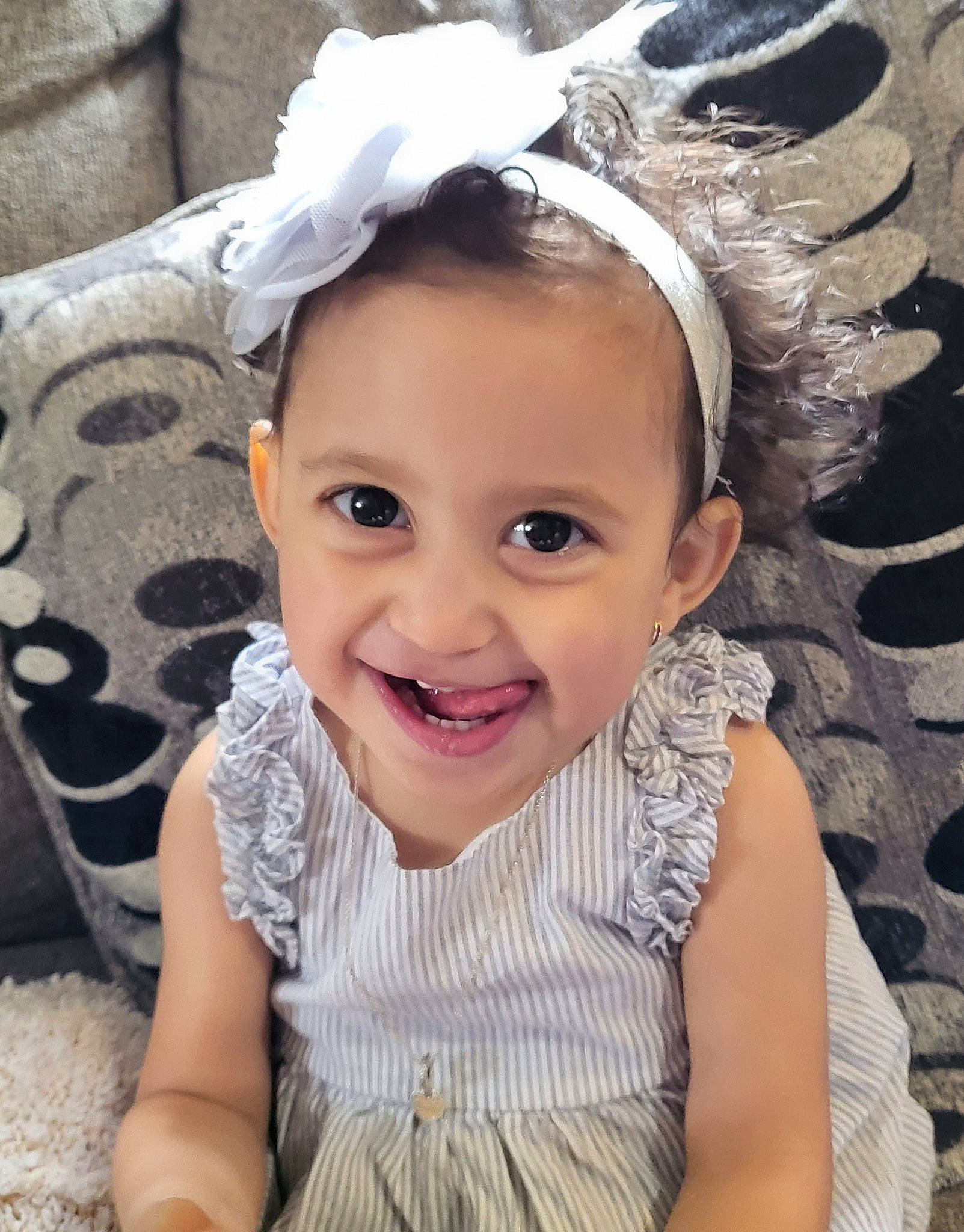 Mikayla is registered to the contest to win money with this photo: baby_toddler_clothing, beauty, child, clothing, ear, embellishment, eyebrow, eyelash, flash_photography, happy, headband, headgear, headpiece, iris, joy, lip, person, pink, smile, textile