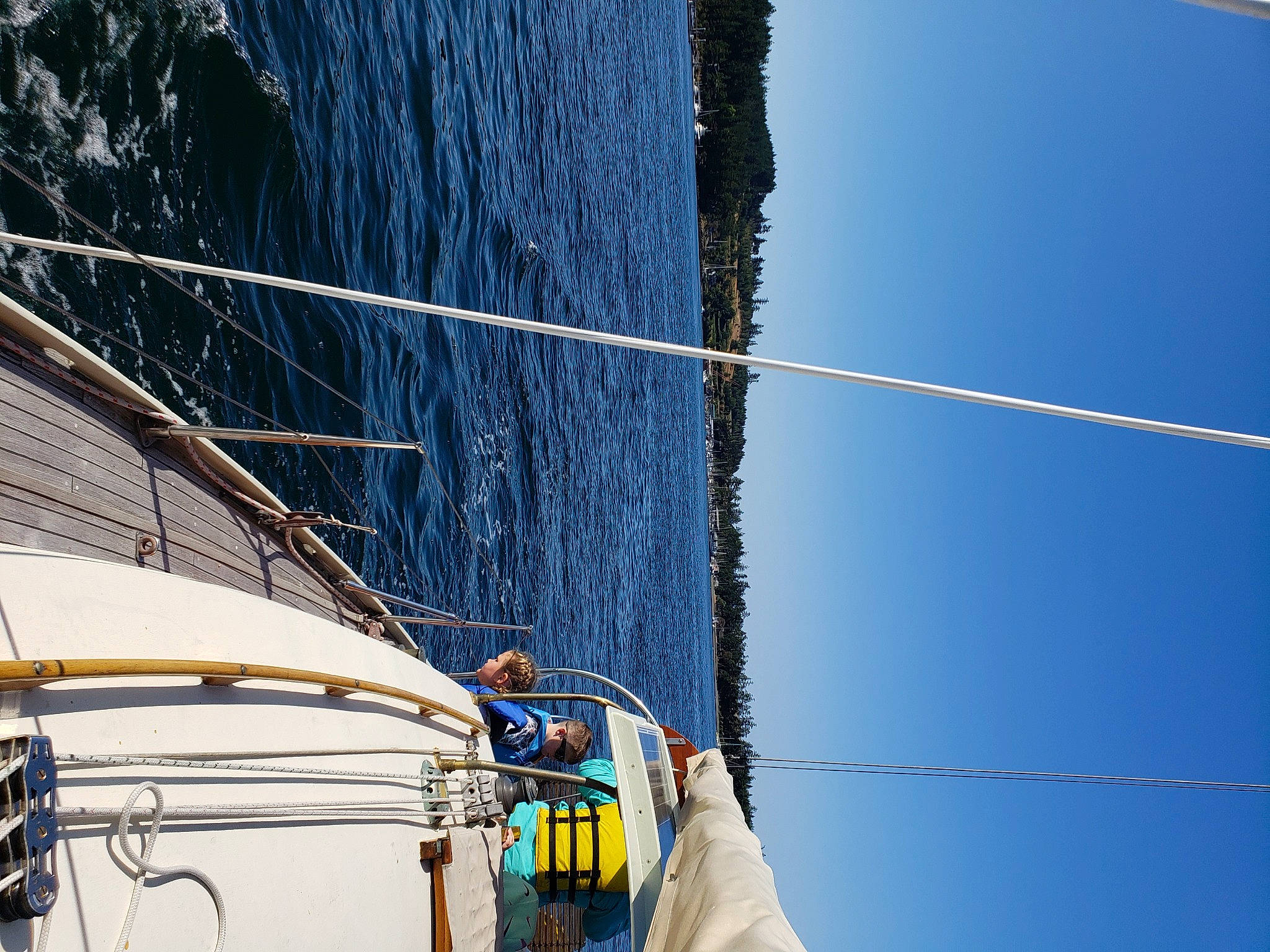 Brycen is registered to the contest to win money with this photo: azure, boat, boats_and_boating_equipment_and_supplies, electric_blue, leisure, mast, naval_architecture, person, recreation, rope, sail, sailboat, sailing, ship, sky, vehicle, water, water_transportation, watercraft, wind