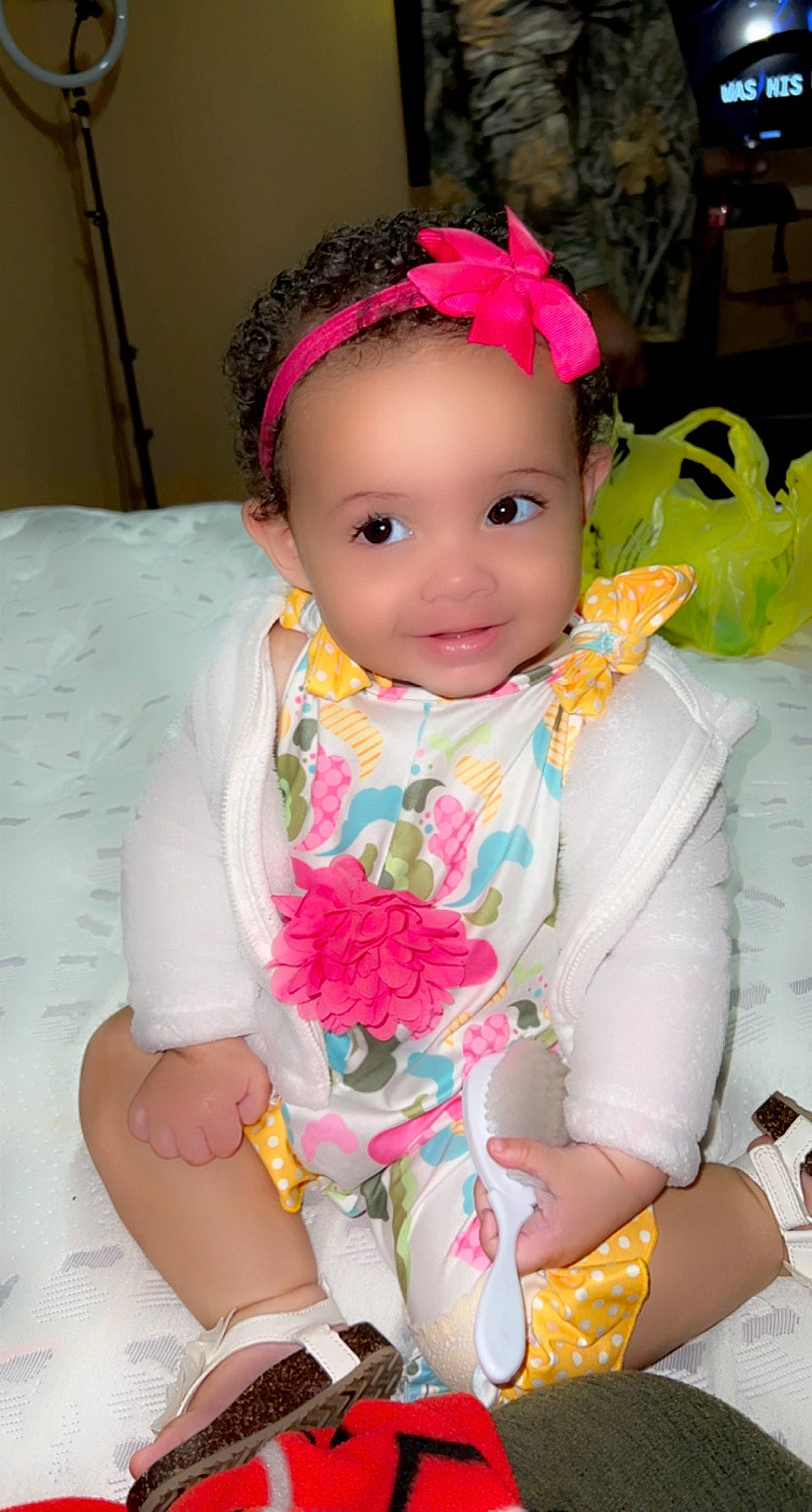 Isabella is registered to the contest to win money with this photo: baby, baby_products, baby_toddler_clothing, cap, cheek, child, dress, fashion_accessory, fun, hair_accessory, happy, headband, headgear, headpiece, joy, magenta, person, pink, skin, sleeve