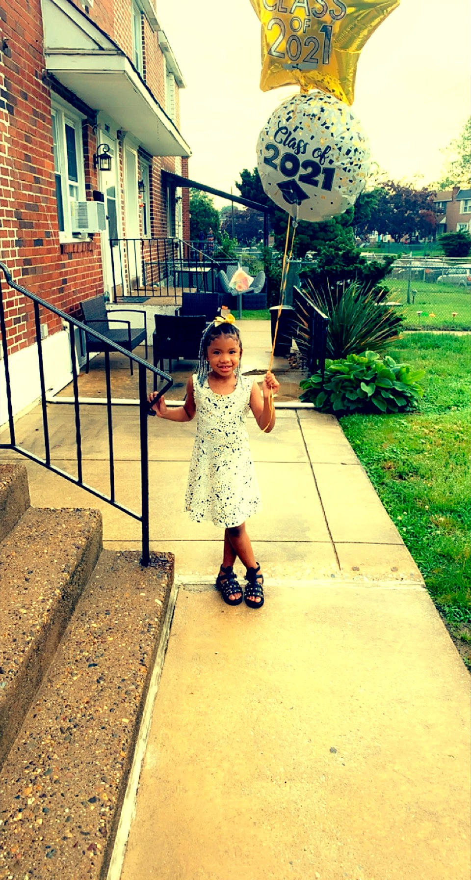 Kiyon is registered to the contest to win money with this photo: building, fun, grass, green, happy, house, joy, leisure, morning, people_in_nature, person, plant, recreation, road, road_surface, stairs, summer, sunlight, tints_and_shades, toddler