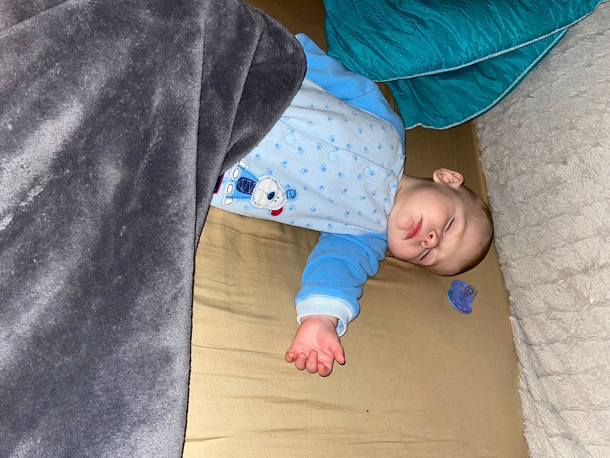 Braxten joined the competition — help win amazing prizes! baby, baby_sleeping, child, finger, floor, flooring, hand, leg, person, play, product, skin, toddler