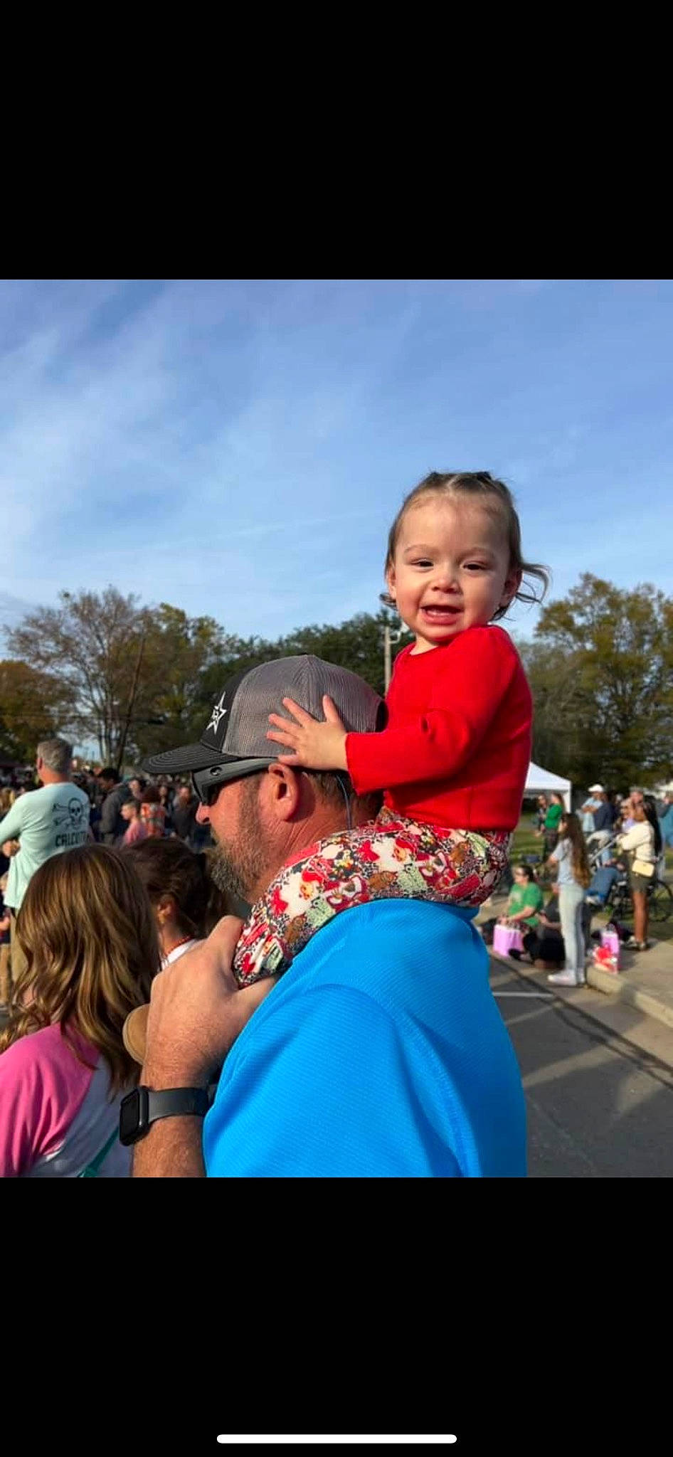 Zara is registered to the contest to win money with this photo: baseball_cap, child, cloud, entertainment, event, festival, fun, happy, hat, headwear, joy, leisure, magenta, performing_arts, person, public_event, recreation, sky, sun_hat, t_shirt