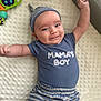 baby, infant, smiling, blue_clothing, striped_hat, striped_pants, lying_down, blanket, toys, cute, happy, child, portrait, indoor, mama's_boy, arms_up, face, headwear, toddler, playpen
