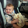 Hayden joined the competition — help win amazing prizes! toddler, car_seat, blanket, child, smile, babytrend, car_interior, window, rain, seatbelt, clothing, cute, happy, baby, person, head, face, seat, holding, indoors