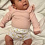 Piper-Mae is registered to the contest to win money with this photo: baby, bed, bedroom, bodypart, clothing, couch, diaper, face, finger, furniture, hand, head, indoors, newborn, pants, person, photography, portrait, room, shorts