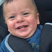Joseph joined the competition — help win amazing prizes! baby, smiling, face, child, stroller, blue_clothing, happy, outdoor, people, crowd, person, infant, teeth, head, seatbelt, urban, daylight, cute, closeup, portrait