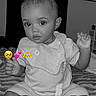 baby, child, infant, black_and_white, sitting, bib, pacifier, hair_clip, blanket, indoor, cute, face, hands, feet, expression, young_child, portrait, person, emojis, decor
