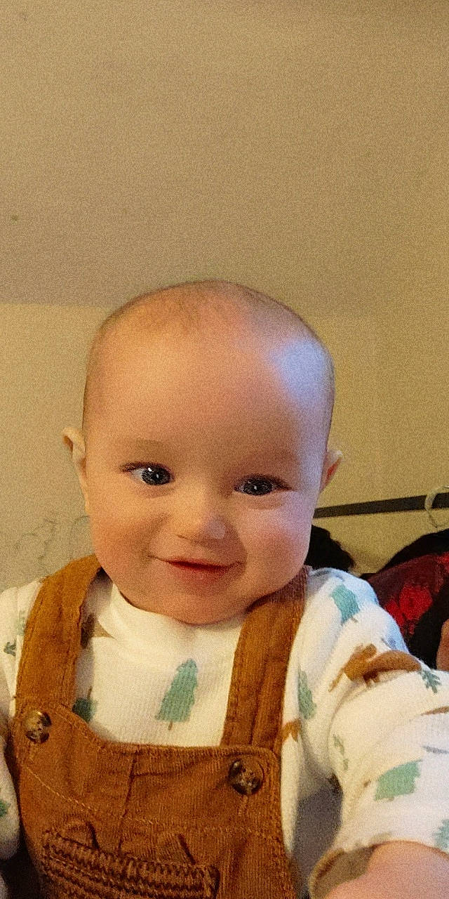 Aidyn joined the competition — help win amazing prizes! baby, baby_products, baby_toddler_clothing, bib, cheek, child, collar, ear, eyebrow, eyelash, happy, iris, joy, lip, nose, person, selfie, sitting, skin, sleeve