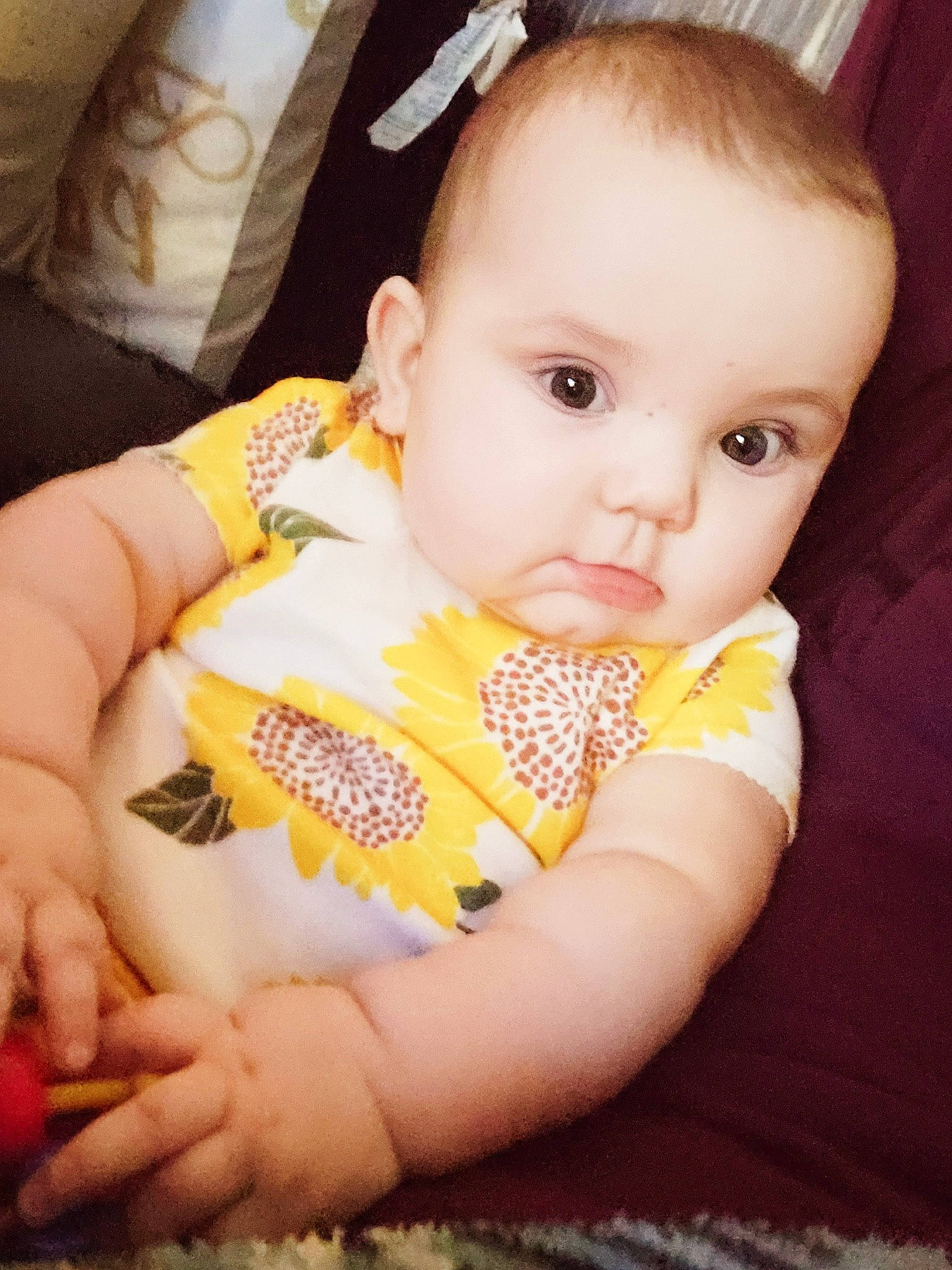 Charli is registered to the contest to win money with this photo: baby, baby_products, baby_toddler_clothing, cheek, child, comfort, eyebrow, eyelash, finger, gesture, hand, iris, lip, mouth, nail, neck, nose, person, skin, thumb