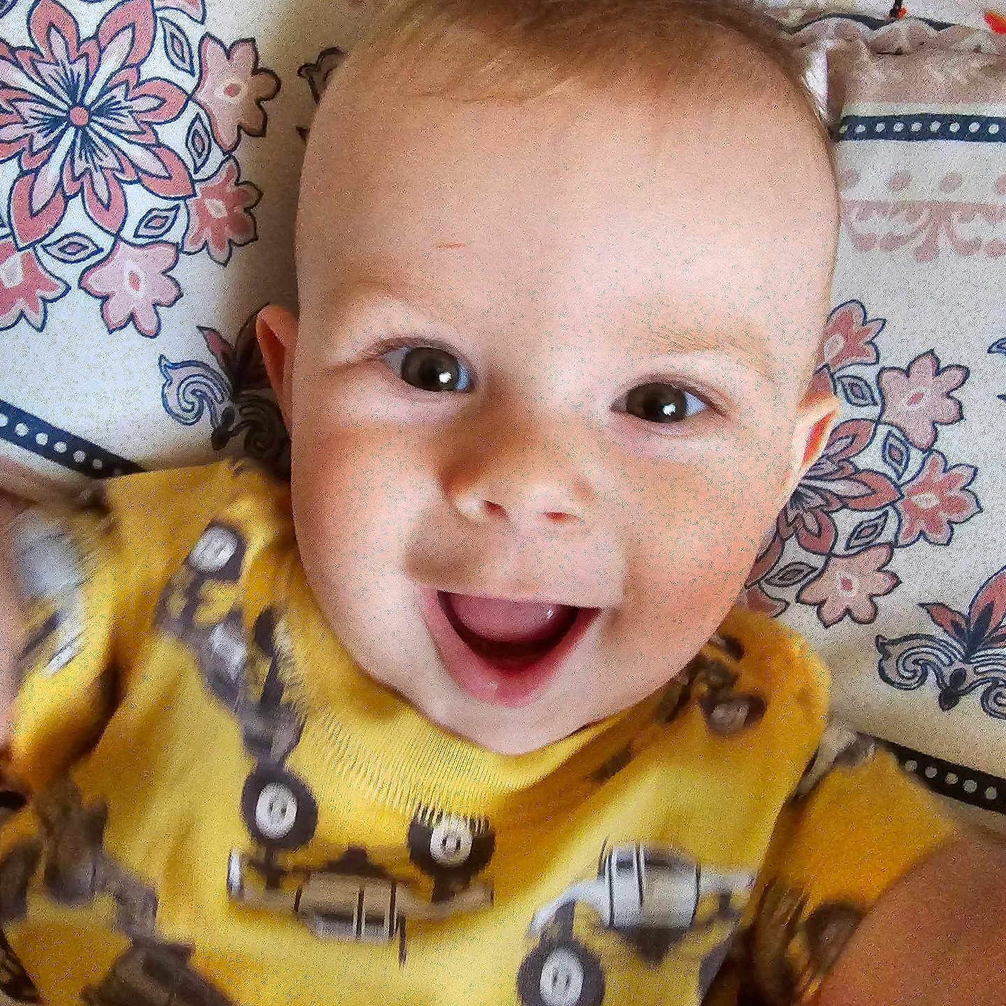 Gabriel is registered to the contest to win money with this photo: baby, babylaughing, bodypart, clothing, cushion, face, happy, head, homedecor, laughing, machine, mouth, person, photography, portrait, selfie, smile, t_shirt, teeth, wheel