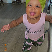 Malaysia is registered to the contest to win money with this photo: baby, bodypart, bonnet, cap, clothing, door, face, footwear, hardwood, hat, head, pants, person, photography, plywood, portrait, sandal, shoe, shorts, wood