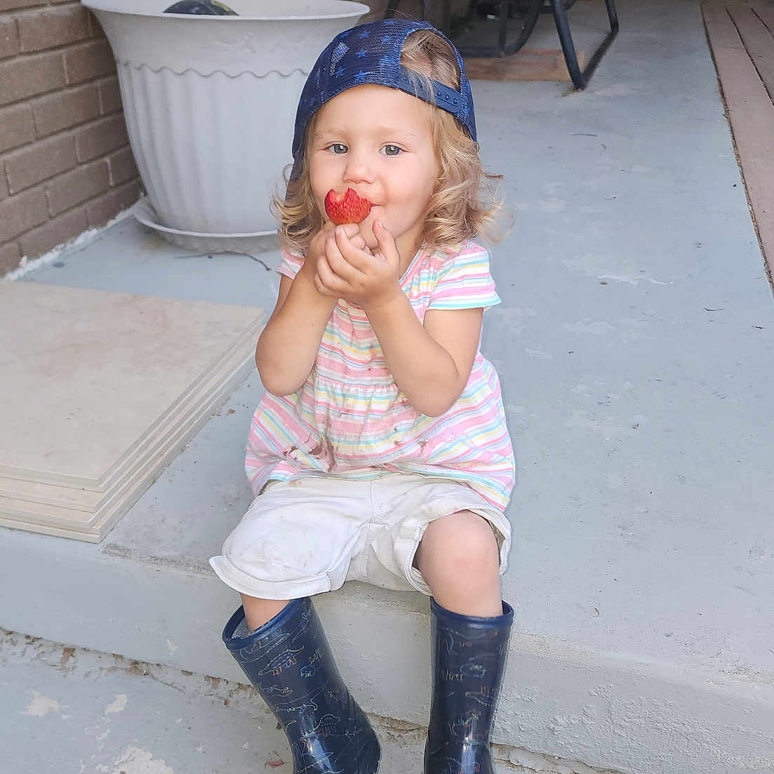 Matilda joined the competition — help win amazing prizes! boot, chair, child, clothing, face, female, footwear, furniture, girl, hat, head, pants, person, photography, plant, portrait, pottedplant, ridingboot, shoe, shorts