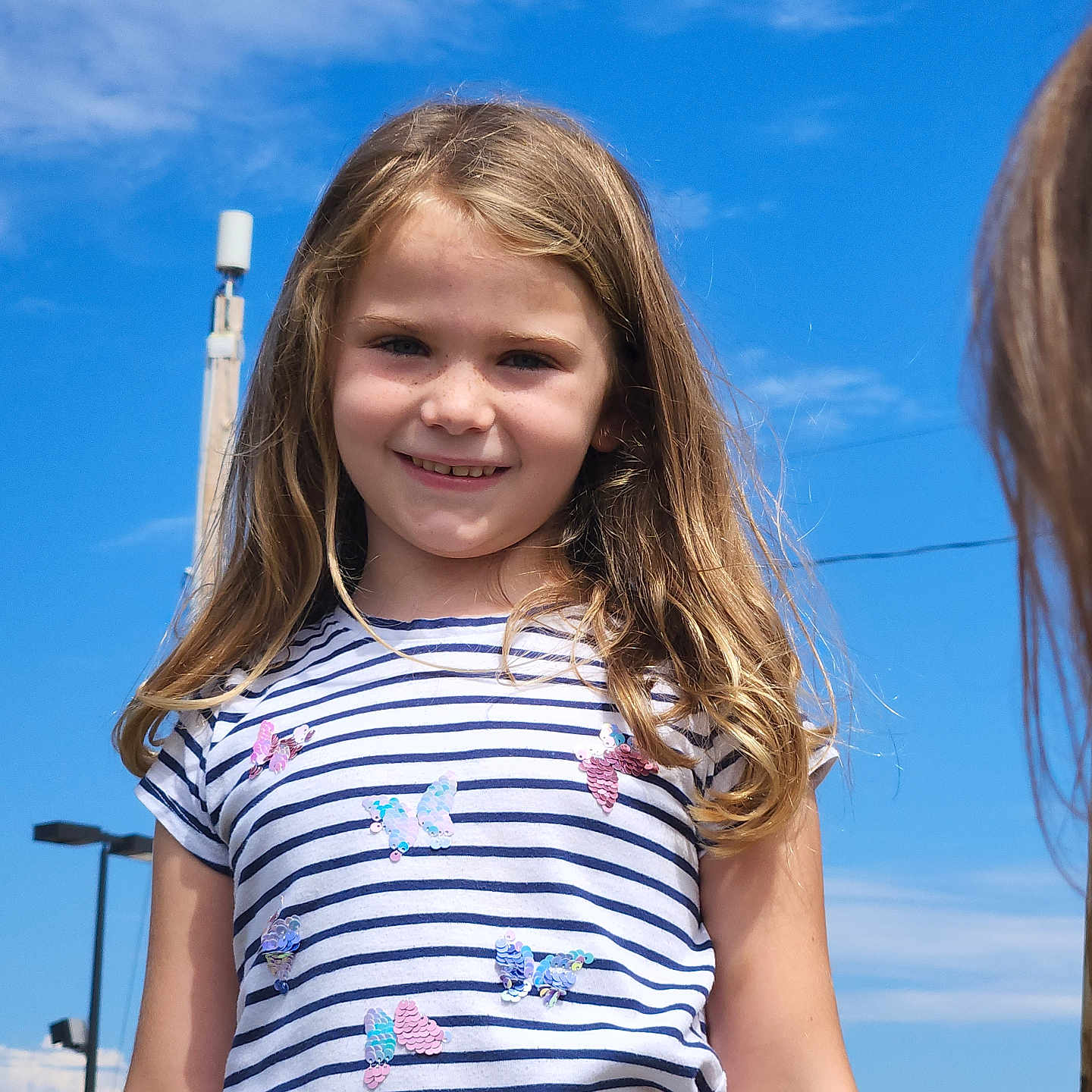 Avery Grace is registered to the contest to win money with this photo: blonde, blouse, bodypart, candle, child, clothing, face, female, finger, girl, hair, hand, happy, head, person, photography, portrait, sleeve, smile, t_shirt