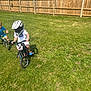 Josiah joined the competition — help win amazing prizes! active, bicycle, bike, casual_clothing, child, children, fence, fun, grass, greenery, helmet, outdoor, play, racing, shadow, sport, summer, sunny, tree, yard
