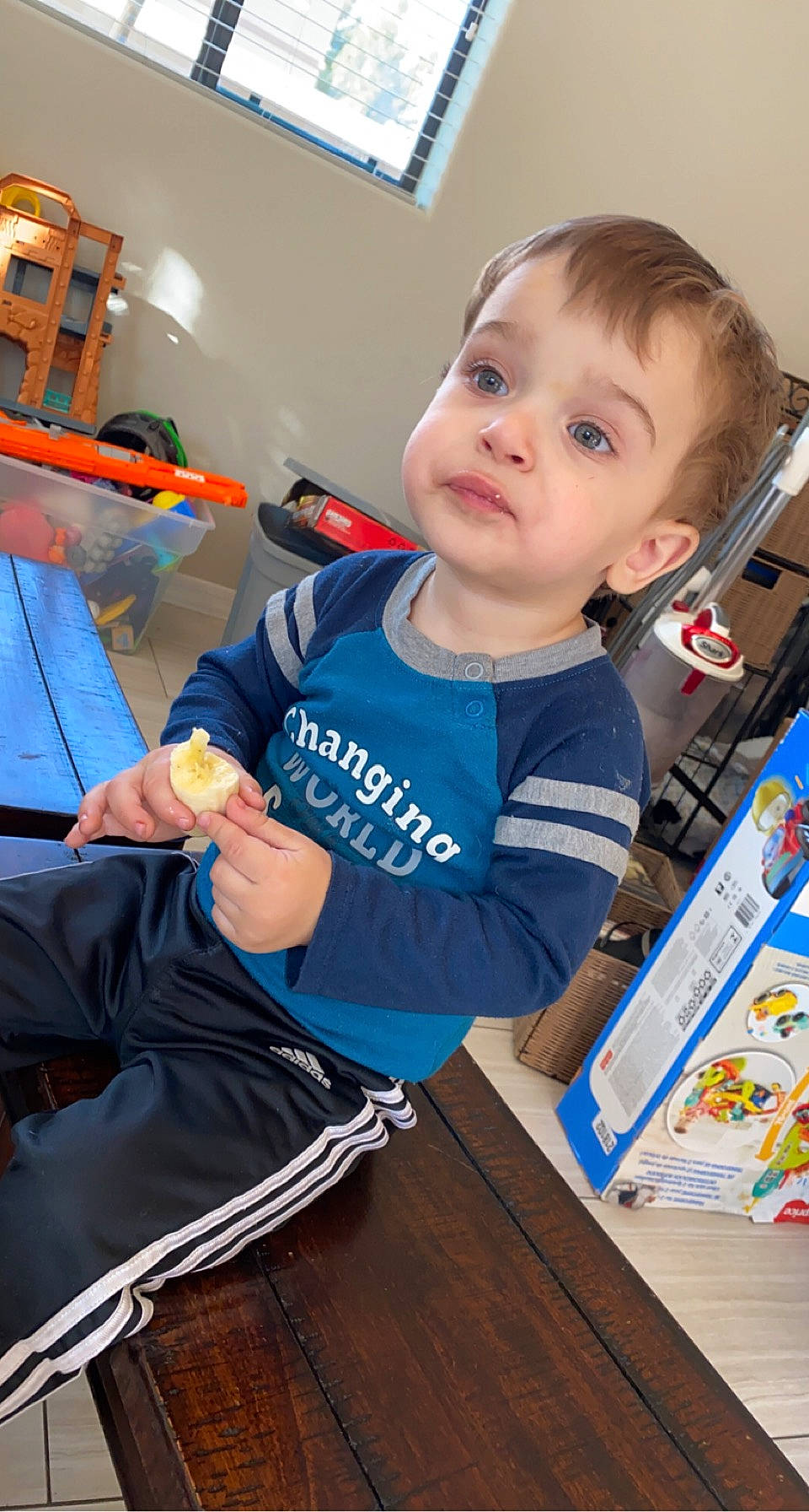 Carter joined the competition — help win amazing prizes! baby, baby_products, baby_toddler_clothing, chair, child, electric_blue, fun, person, personal_protective_equipment, play, room, sitting, t_shirt, toddler